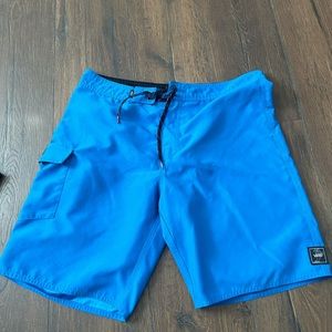 Men’s board shorts/ swim trunks